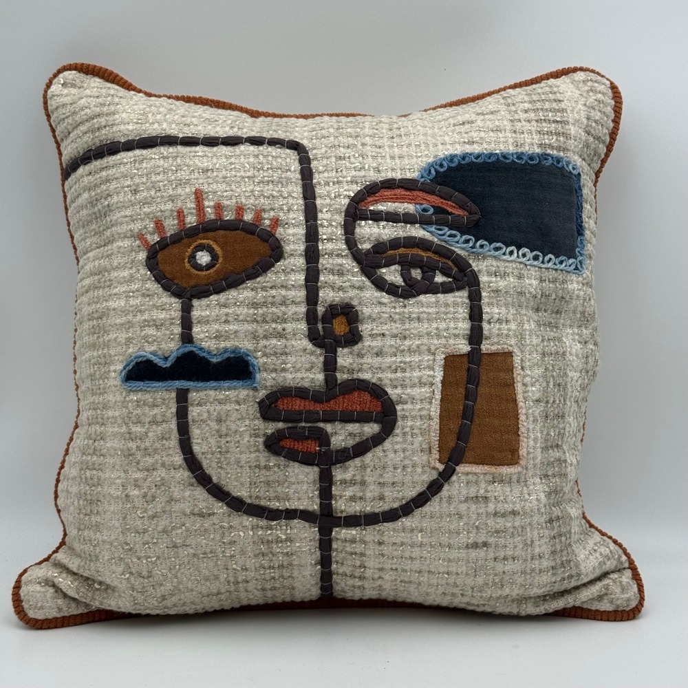 World Market Abstract Face Embroidered Throw Pillow Metallic Silver Rust Trim